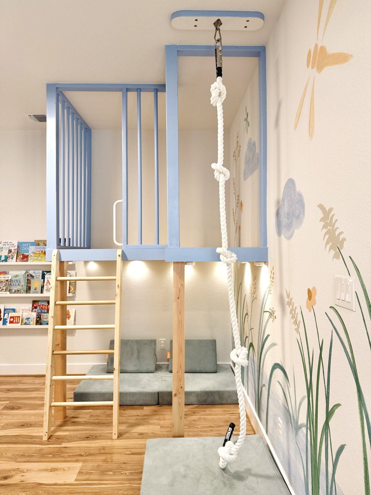 After: the blue play loft, ladder, climbing rope and reading nook