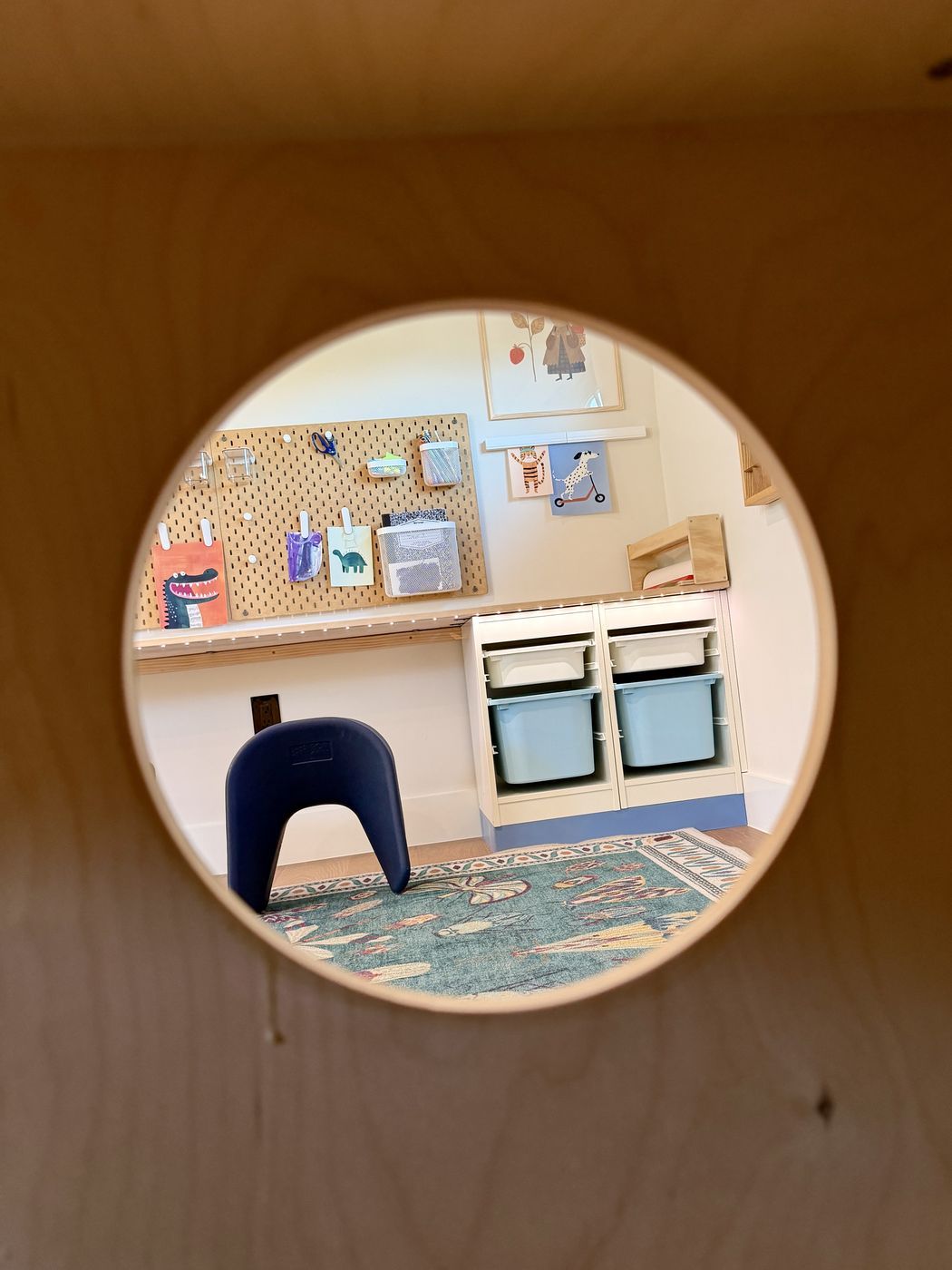 Art station through playhouse window