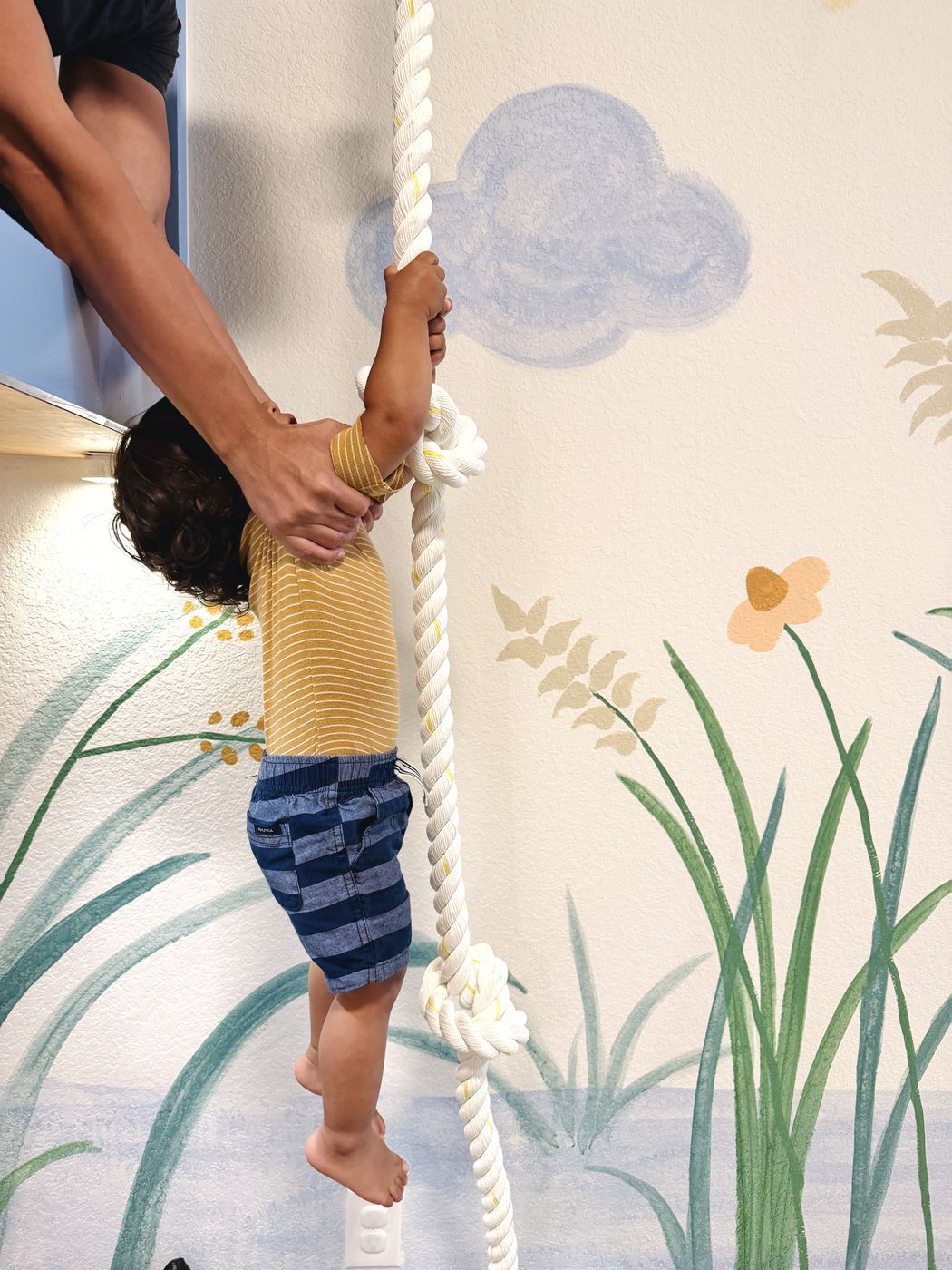 Assisted child rope climb