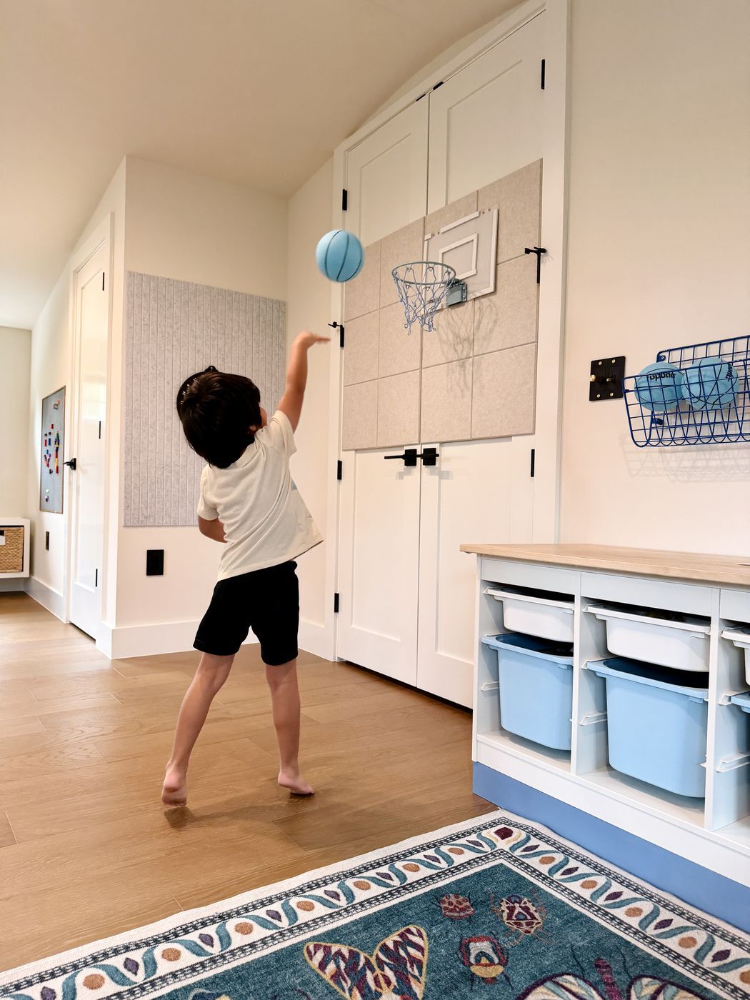 Child playing door basketball
