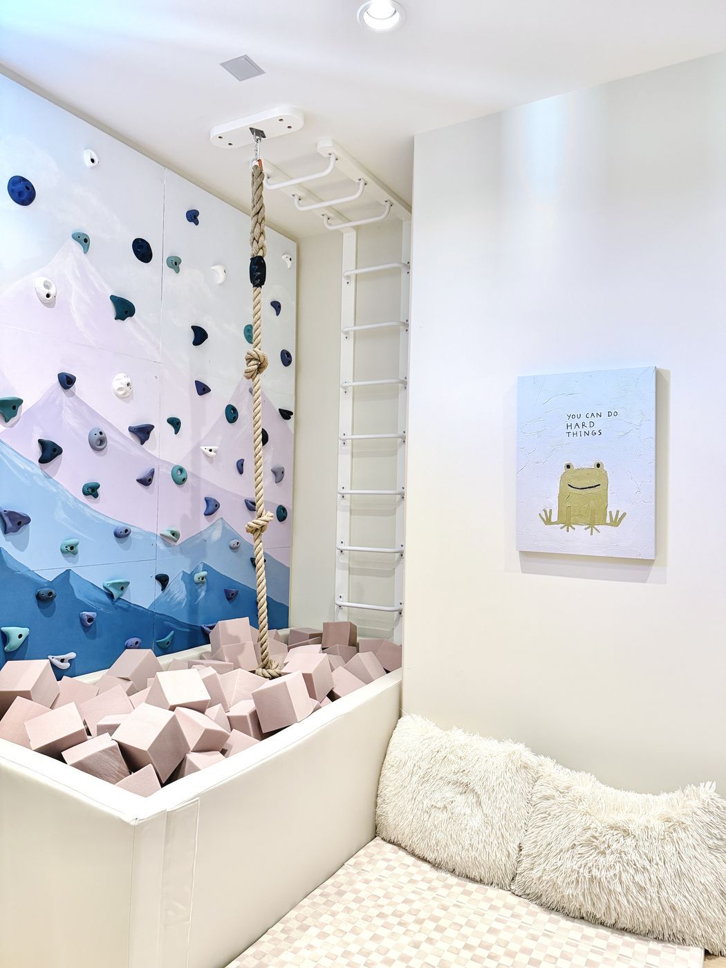 Climbing wall foam pit and reading seat