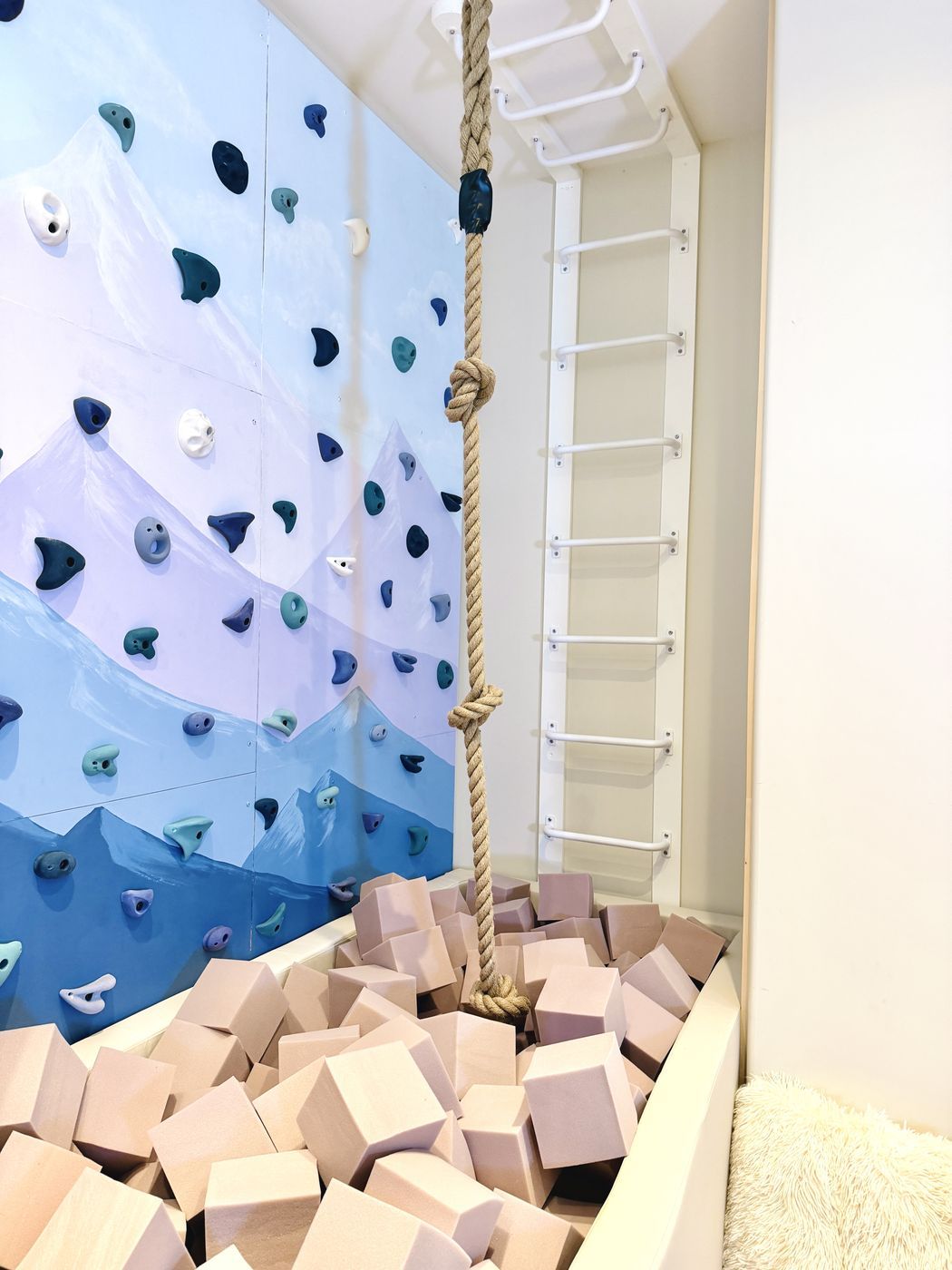 Mountain climbing wall and foam blocks