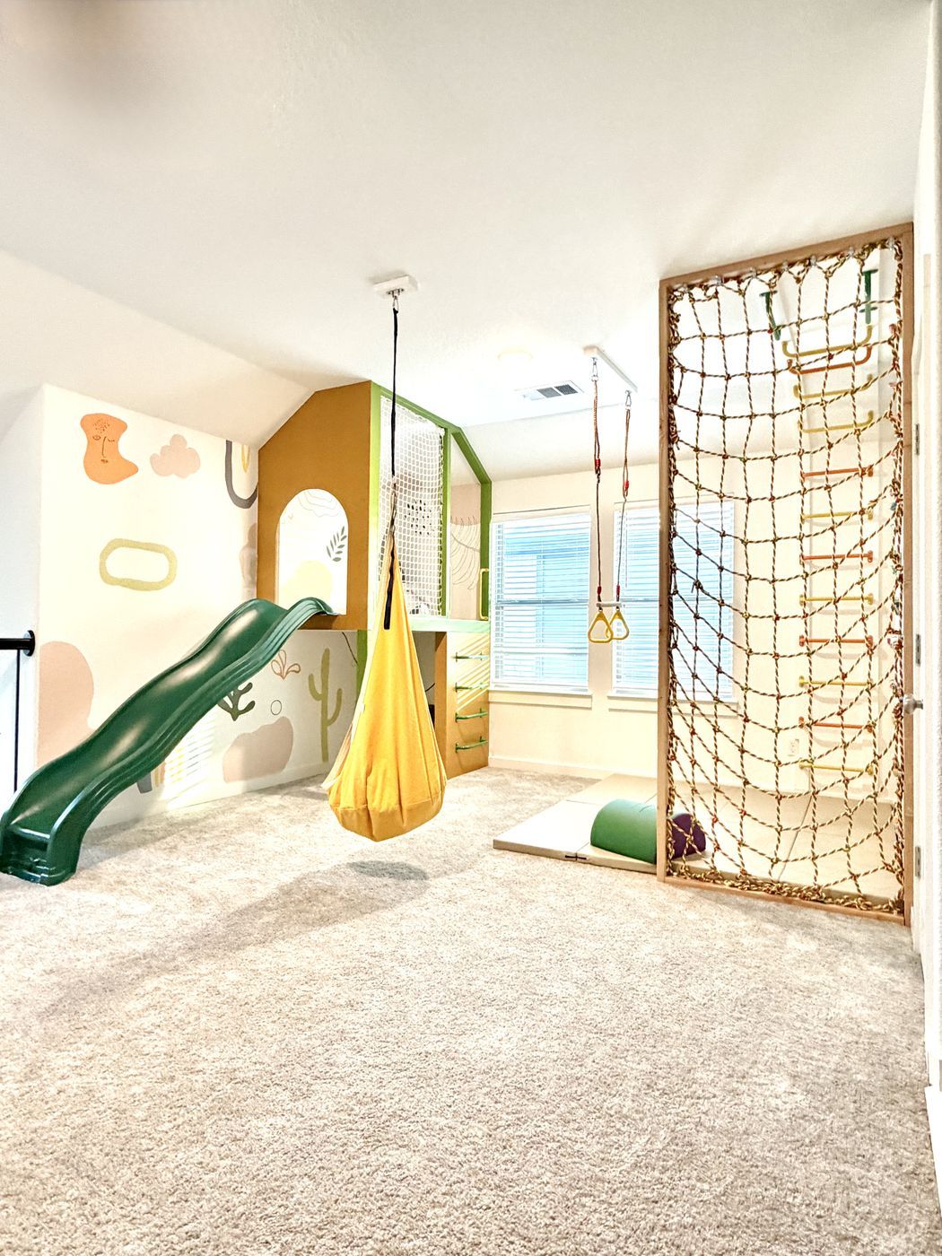 Playroom slide swing rope net